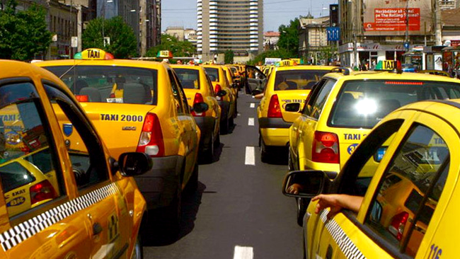 Taximetristii va vor lua banii, dar vor purta banderole albe
