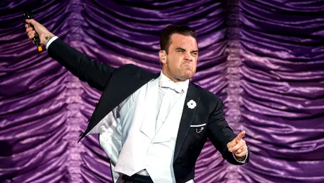 S-a confirmat oficial! Robbie Williams cântă live la Bucureşti pe 17 iulie! Iată cât costă biletele!