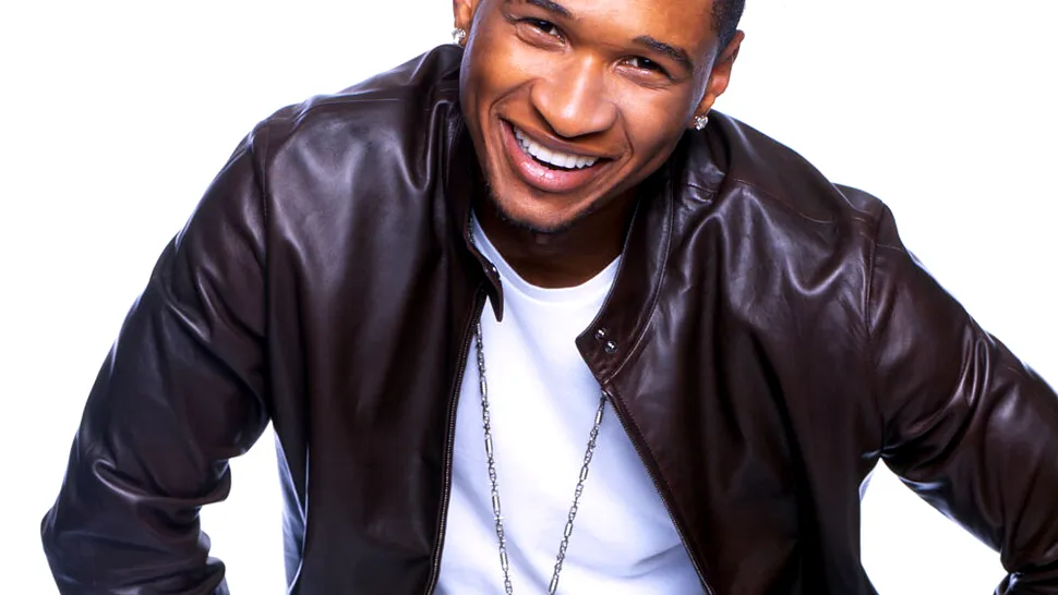 Usher, lovit de o fana in timpul unui concert (Video)