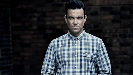 Robbie Williams revine în industria modei