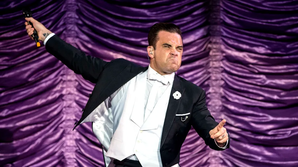 S-a confirmat oficial! Robbie Williams cântă live la Bucureşti pe 17 iulie! Iată cât costă biletele!
