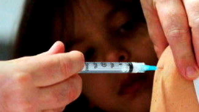 Multi romanii speriati de virusul A/H1N1 s-au decis sa se vaccineze impotriva gripei porcine