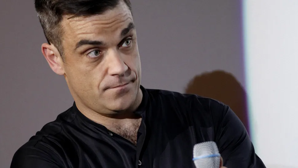 Vezi noul clip al lui Robbie Williams, pentru piesa 