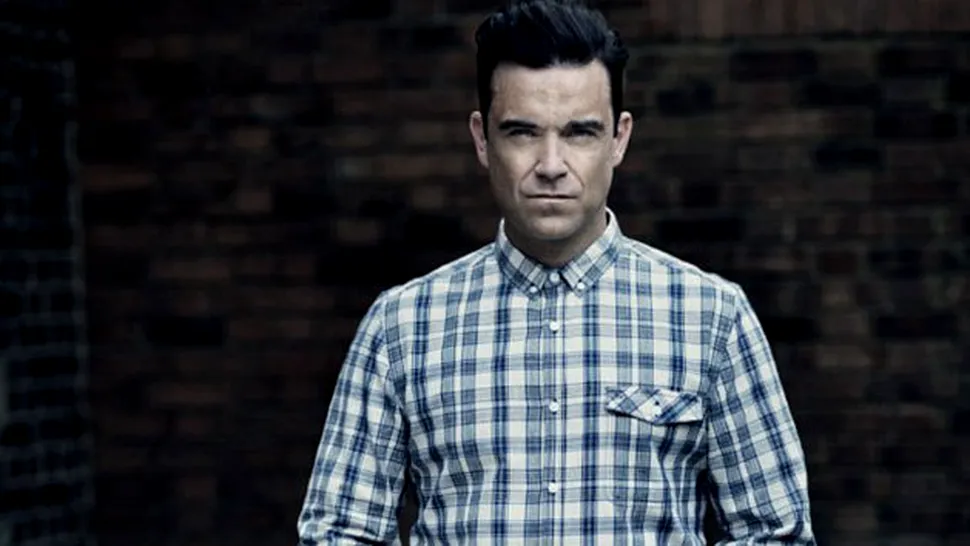 Robbie Williams revine în industria modei