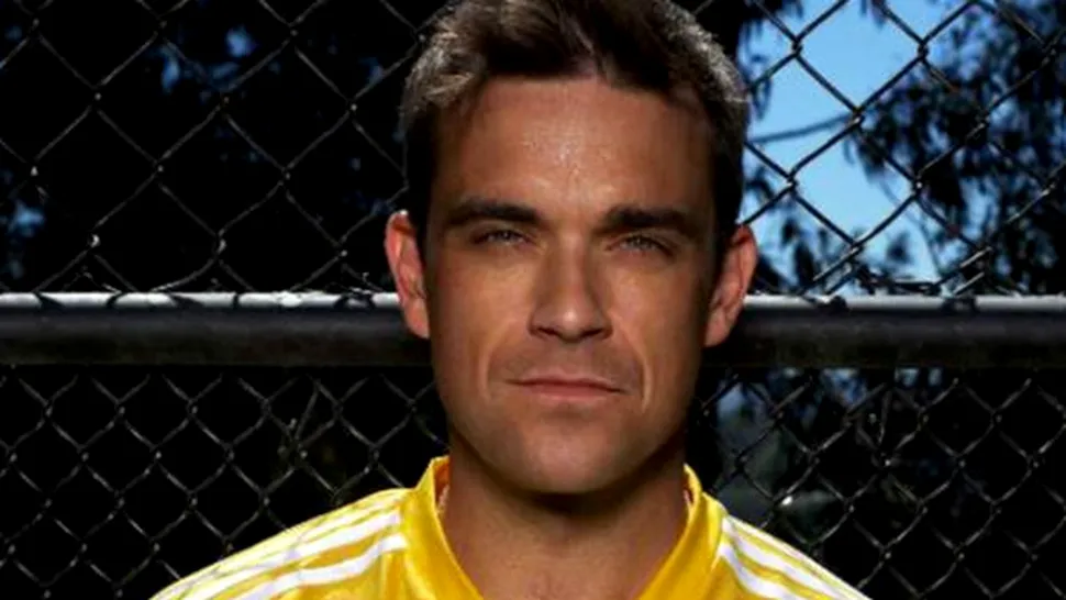 Robbie Williams ar face sex cu Brad Pitt