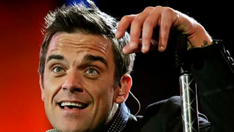 Robbie Williams revine pe scena alaturi de trupa Take That