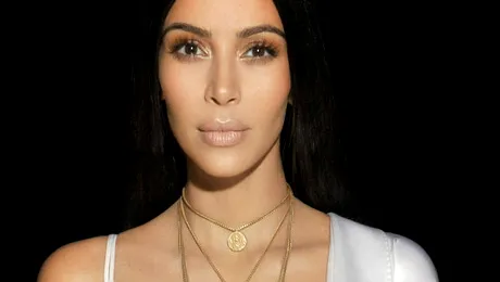 Kim Kardashian: ”M-a aruncat pe pat şi m-am gândit «Până aici mi-a fost!»”