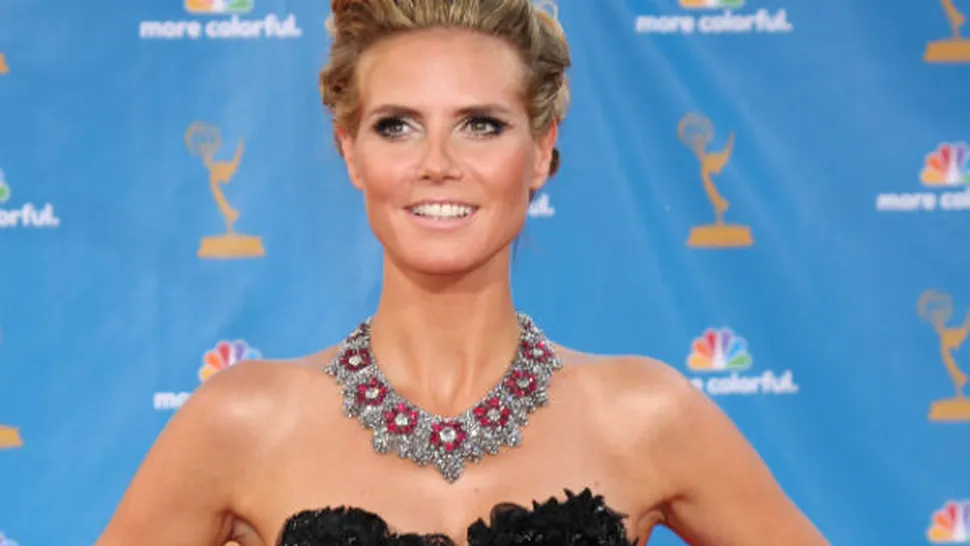 Heidi Klum, apetisantă în costum de baie