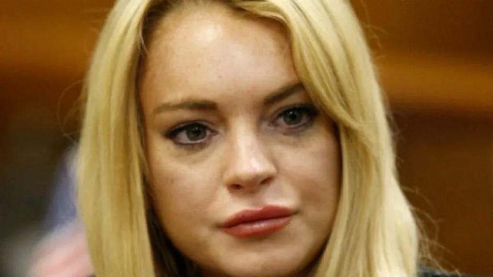 Afla cati bani a primit Lindsay Lohan de la Charlie Sheen!