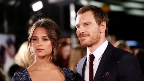 Michael Fassbender, surprins cu un bebeluș în brațe; el și Alicia Vikander ar fi devenit părinți