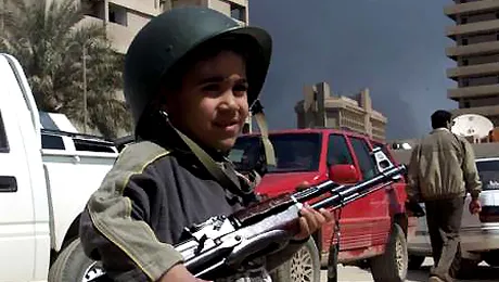 AK-47, „jucaria” copiilor musulmani