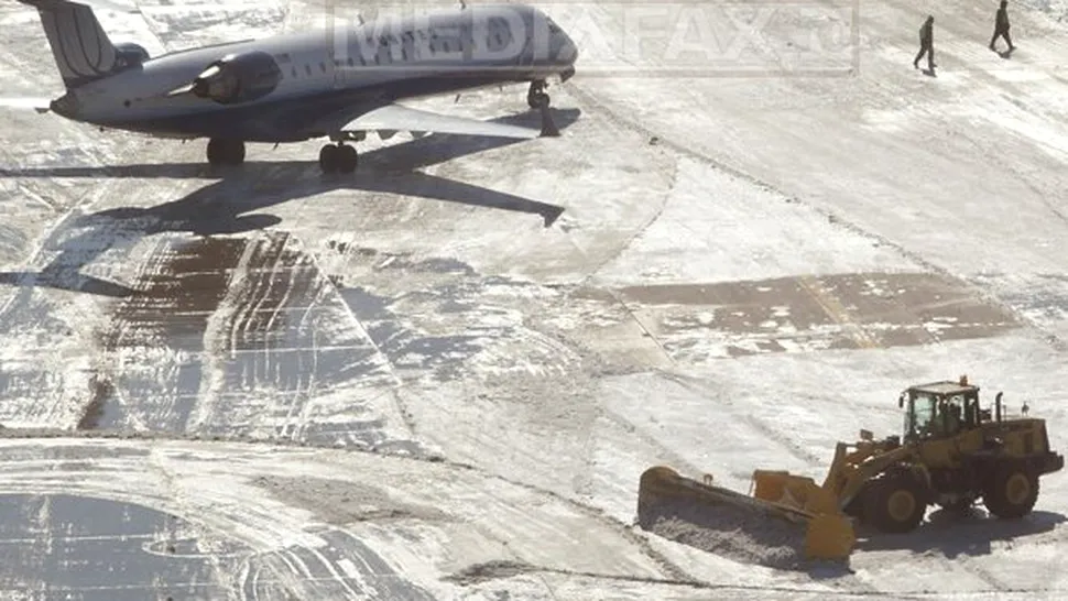 Germania: Peste 300 de zboruri au fost anulate din cauza ninsorii și a poleiului