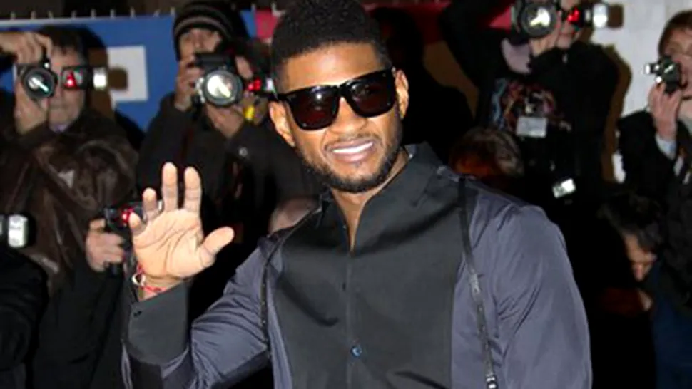 Usher s-a logodit cu managerul său