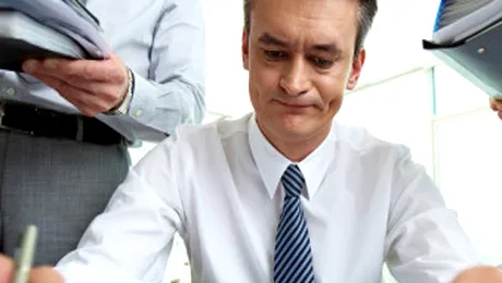 Perfecționiștii și oamenii foarte motivați devin dependenți de muncă