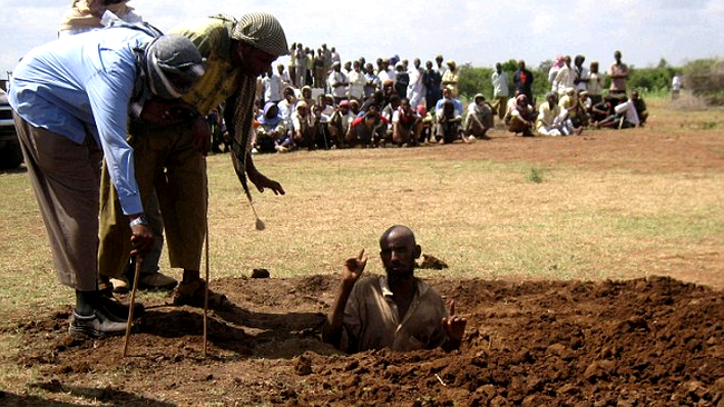 somalez ucis cu pietre