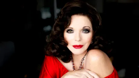 Actrita Joan Collins a lesinat pe covorul rosu din cauza rochiei prea stramte