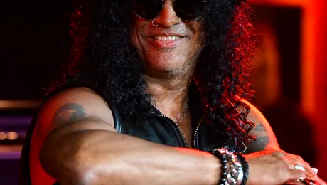 Slash a divorțat după 13 ani de mariaj