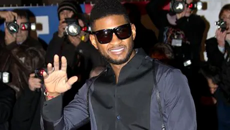 Usher s-a logodit cu managerul său