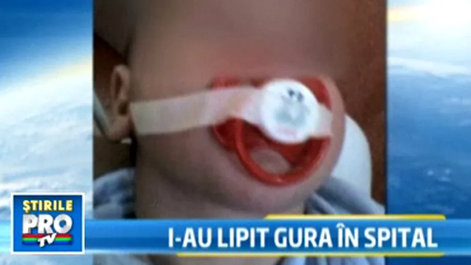 I-a lipit suzeta de gura cu leucoplast unui bebelus pentru ca plangea (Video)