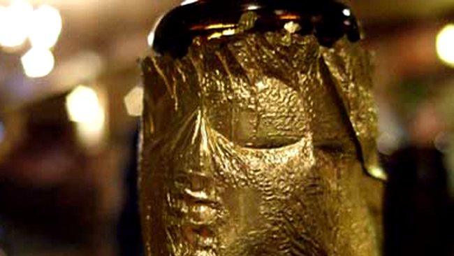 chipul lui Iisus pe sticla de bere