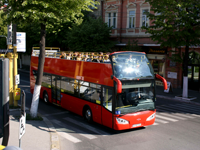Autobuzele supraetajate reprezinta ceva normal pentru turistii din marile orase