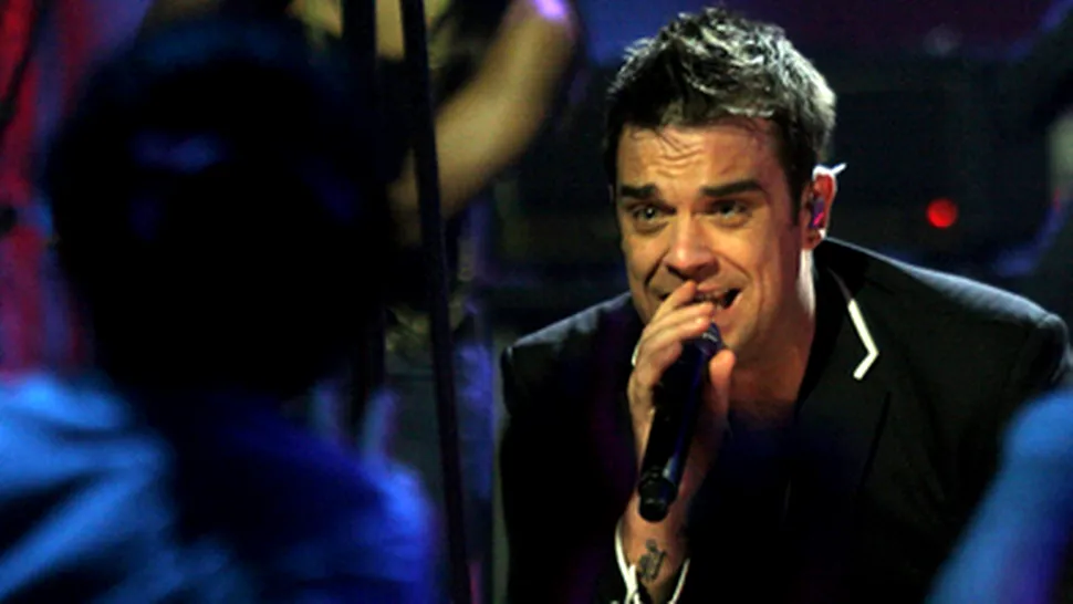 Robbie Williams si-a cerut iubita de sotie, la radio